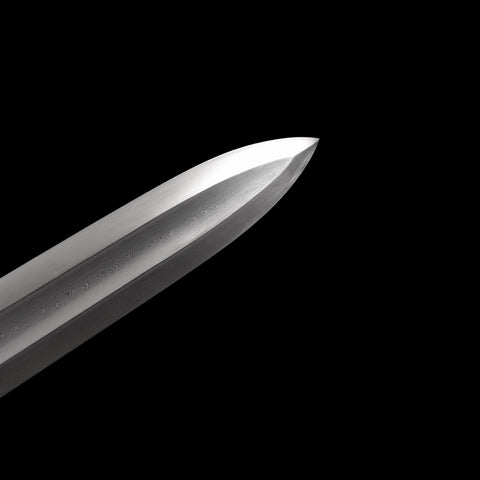 Close up of sharp blade tip on Conan Mother’s Sword replica hand forged from Damascus steel