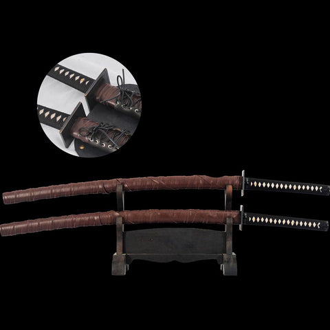 Blackened brass tsuba with rectangular design on Deadpool katana sword