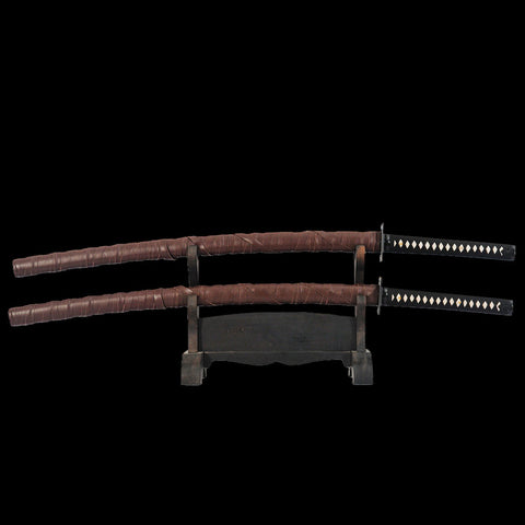 Complete Deadpool twin katana swords set showing both blades and matching mountings