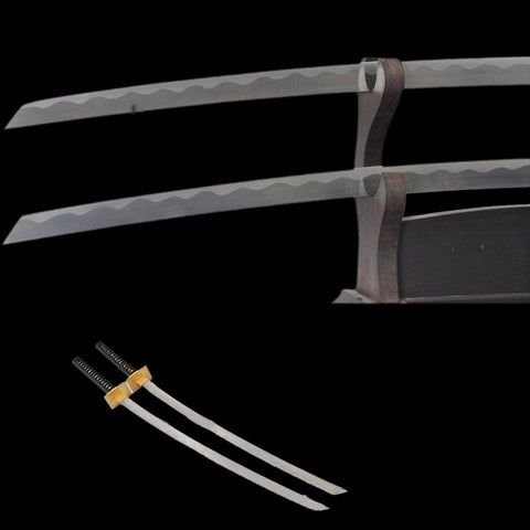 Close up of folded steel blade with visible hada pattern on Deadpool sword