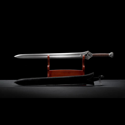 Horizontal view of hand forged Damascus steel Conan movie sword replica on display