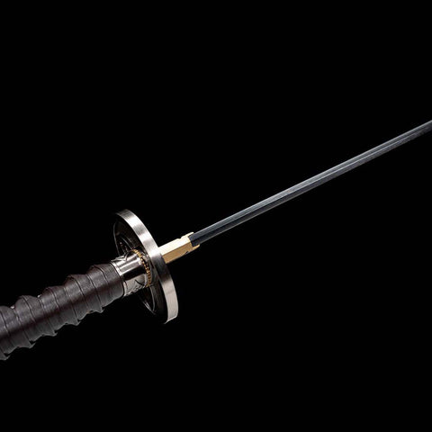 Side view of Japanese katana tsuba on handmade Hattori Hanzo sword