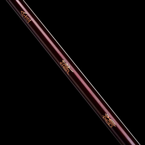 Close-up of black-gold plated stainless steel shaft of Ruyi Jingu Bang replica