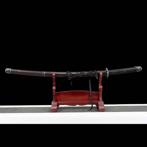 Collector display of Sekiro Undead Cut katana with violet blade