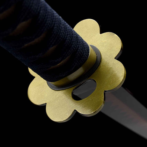 Close-up of synthetic silk ito wrap on Zoro Shusui katana